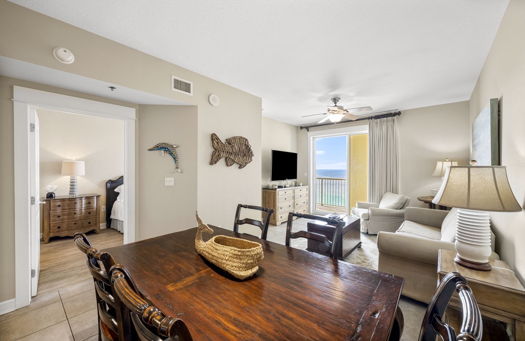 Relax in this coastal-style living and dining area with ocean views.