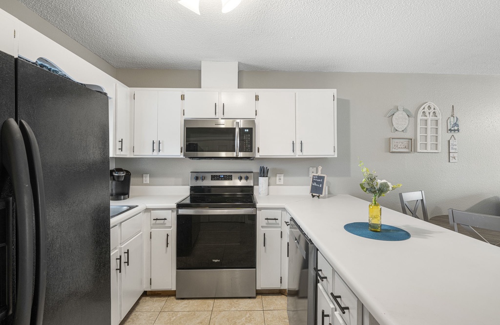 Modern kitchen with stainless steel appliances and ample counter space