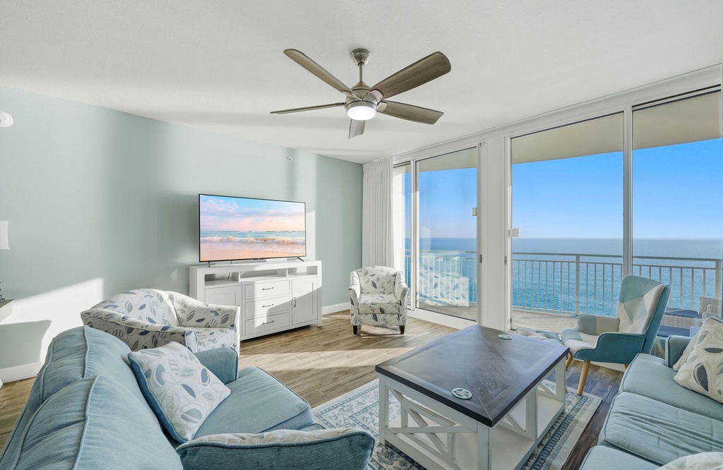 Unwind in your ocean-view living room where sea breezes flow through and endless blue horizons create the perfect backdrop for relaxation.