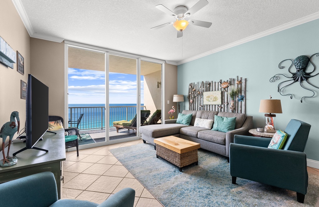 Wake up to breathtaking ocean views from your stylish living room, where coastal colors and comfy seating create your perfect beach retreat.