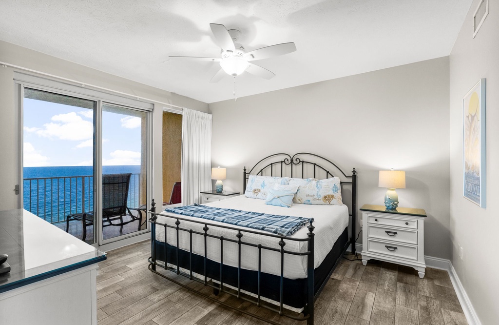 Relax in this coastal bedroom with ocean views and a private balcony.