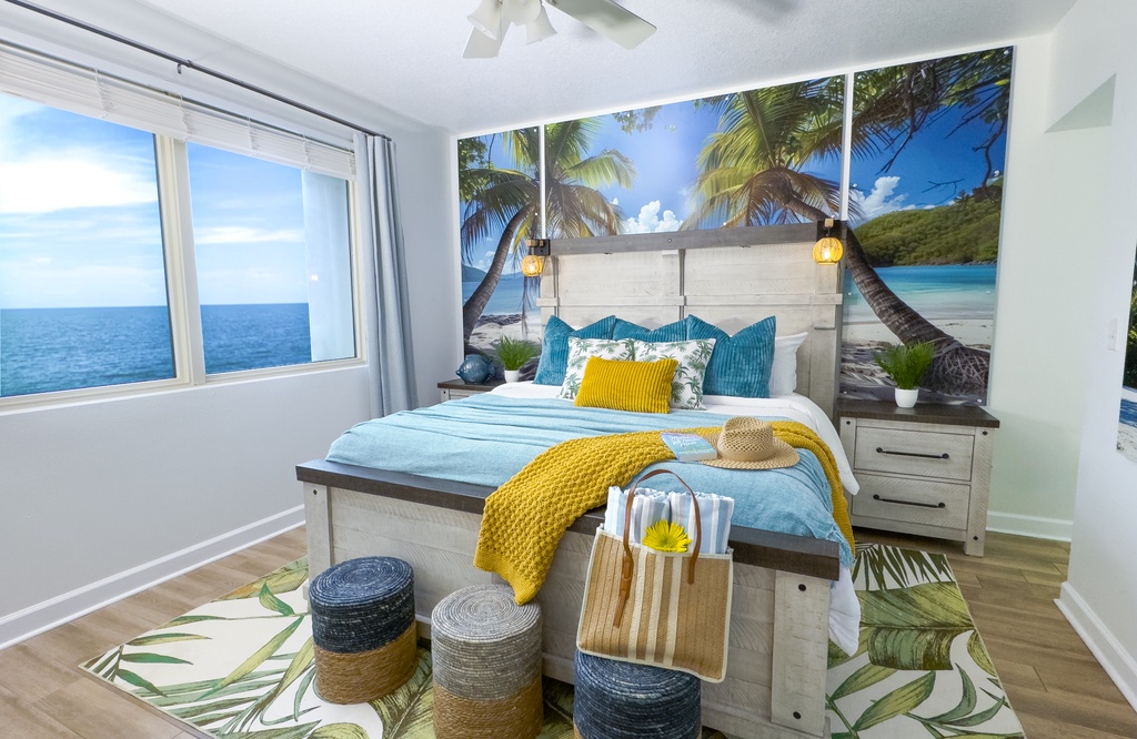Cozy bedroom with ocean view and tropical decor for a relaxing stay