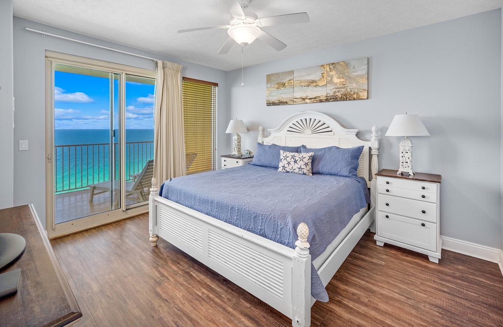 Relax in this coastal bedroom with ocean views and natural light.