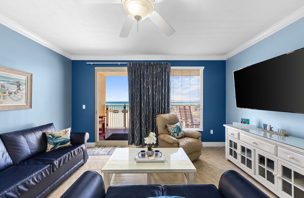 Relax in this coastal living room with ocean views and modern decor.
