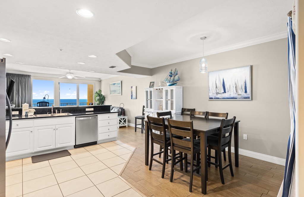 Open dining area with ocean views and modern kitchen amenities