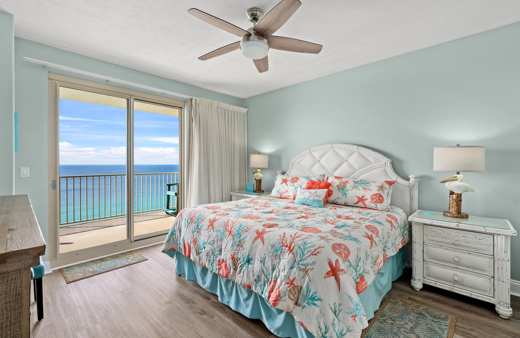 Relax in this coastal bedroom with ocean views and a balcony.