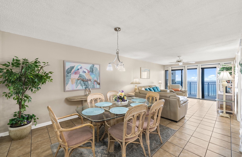 Open living and dining area with ocean views and natural light