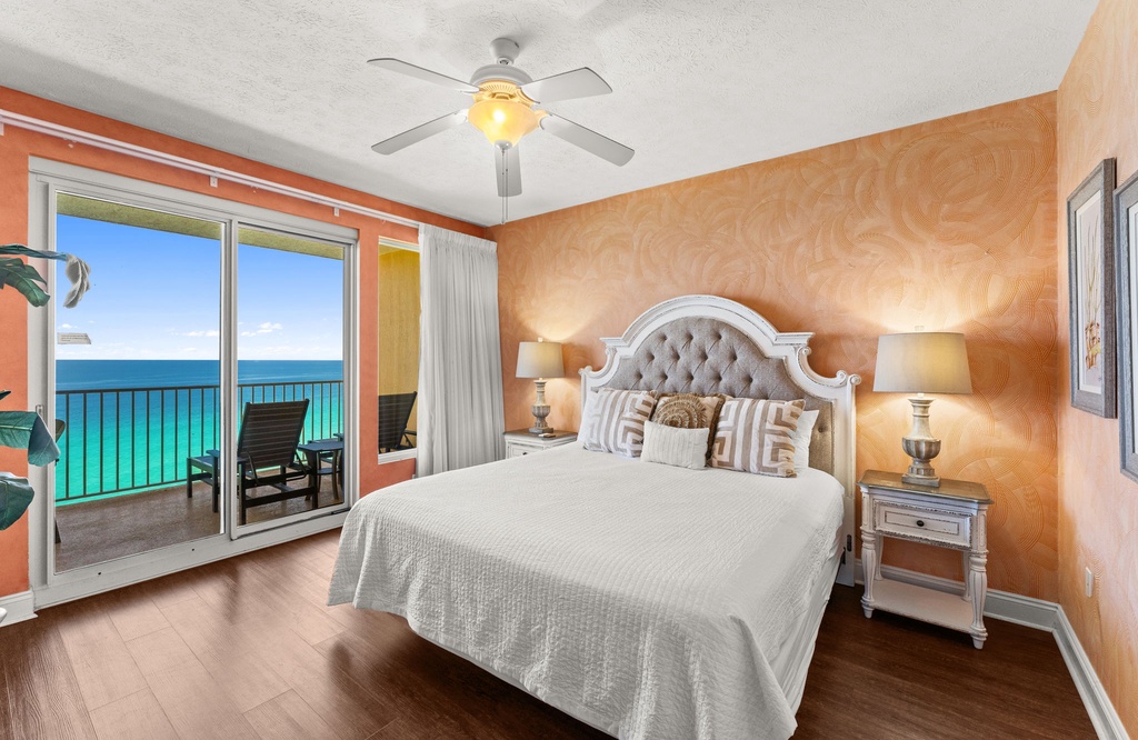 Wake up to stunning ocean views from your plush bed, with vibrant coral walls and direct balcony access to paradise.
