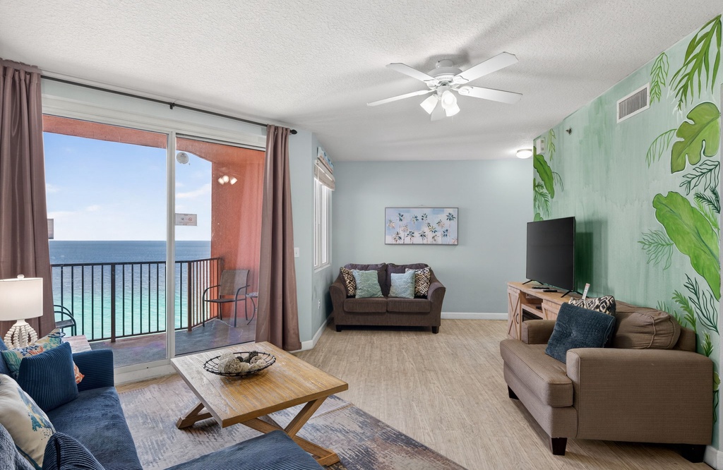 Sink into coastal comfort with stunning sea views from your private balcony and tropical-themed living space.