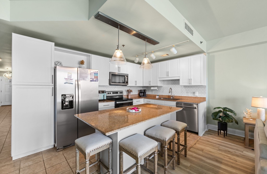 Modern kitchen with a large island and stainless steel appliances