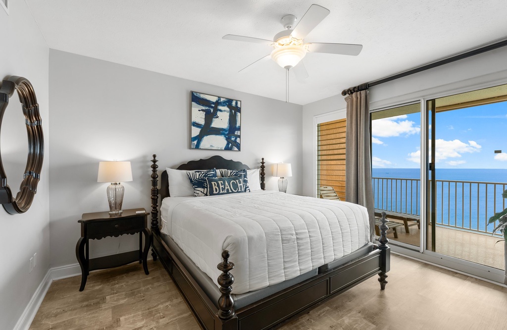 Relax in this coastal bedroom with ocean views and natural light.