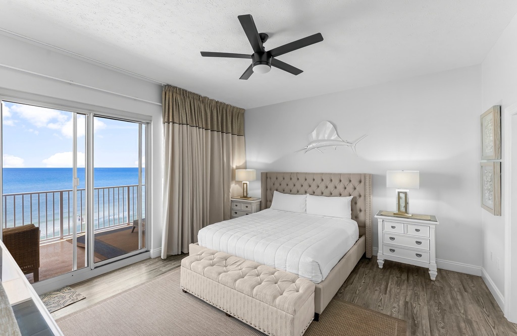 Relax in this modern bedroom with ocean views and direct balcony access.