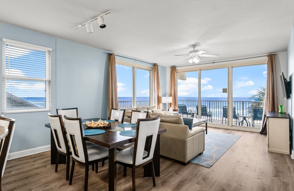 Open living and dining area with ocean views and natural light