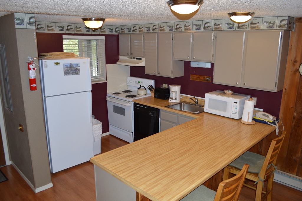 Cook your favorite meals in this fully equipped kitchen with everything you need for a comfortable stay.