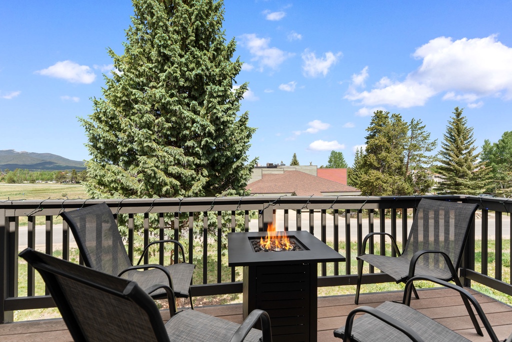 Gather around the firepit on your private deck and take in sweeping mountain and meadow views. This peaceful outdoor space invites you to unwind with morning coffee or evening conversations under open skies.