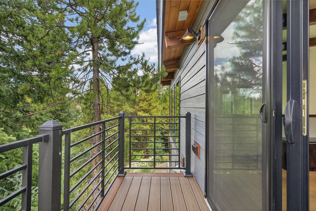 Step onto your private balcony and breathe in the fresh mountain air. Surrounded by towering pines and serene forest views, this peaceful retreat offers the perfect escape to unwind and reconnect with nature.