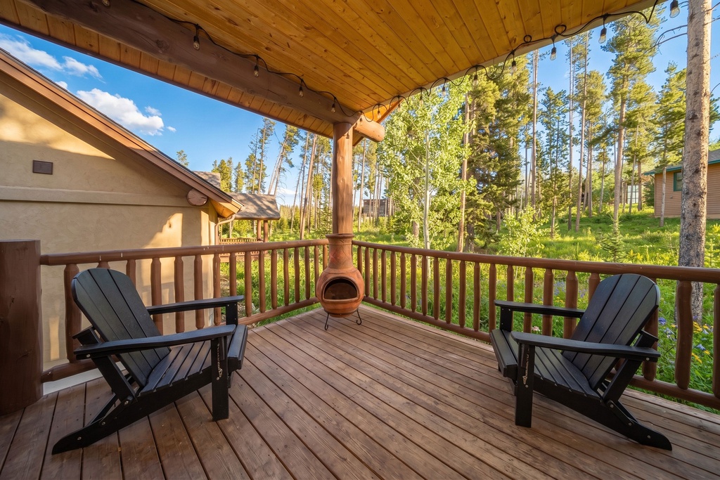 Cozy up on your private patio with summer forest views stretching endlessly before you.