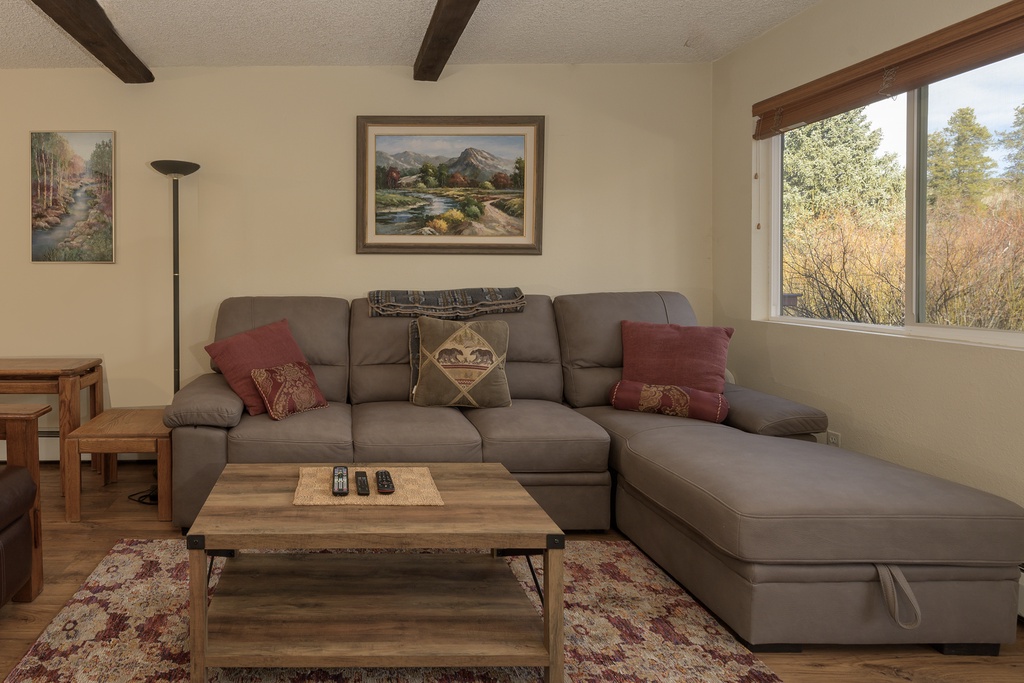 Sink into plush leather seating while autumn views frame your peaceful retreat through panoramic windows.