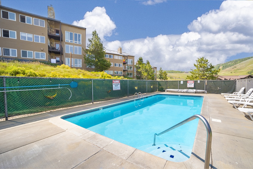 Crisp mountain air meets crystal-clear waters in your own private retreat, where sunlit afternoons by the pool offer stunning panoramic views of the surrounding peaks and valley.
