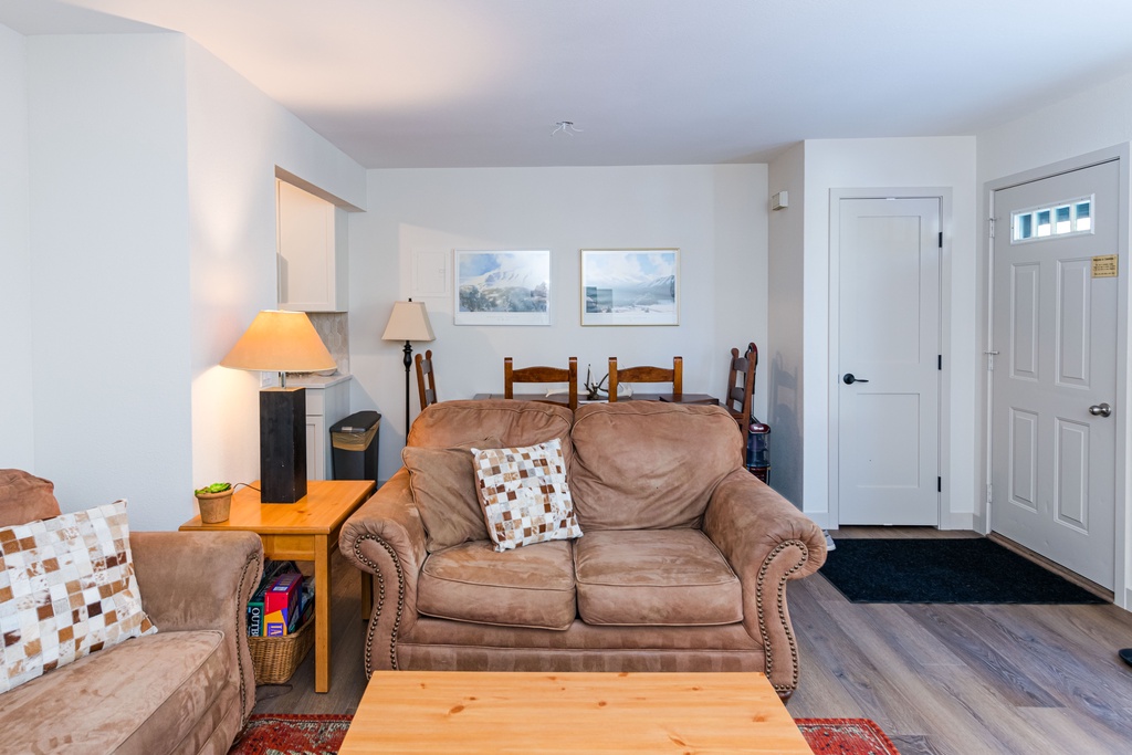 Sink into plush leather seating where warm lamplight creates the perfect ambiance for your evening conversations and relaxation.