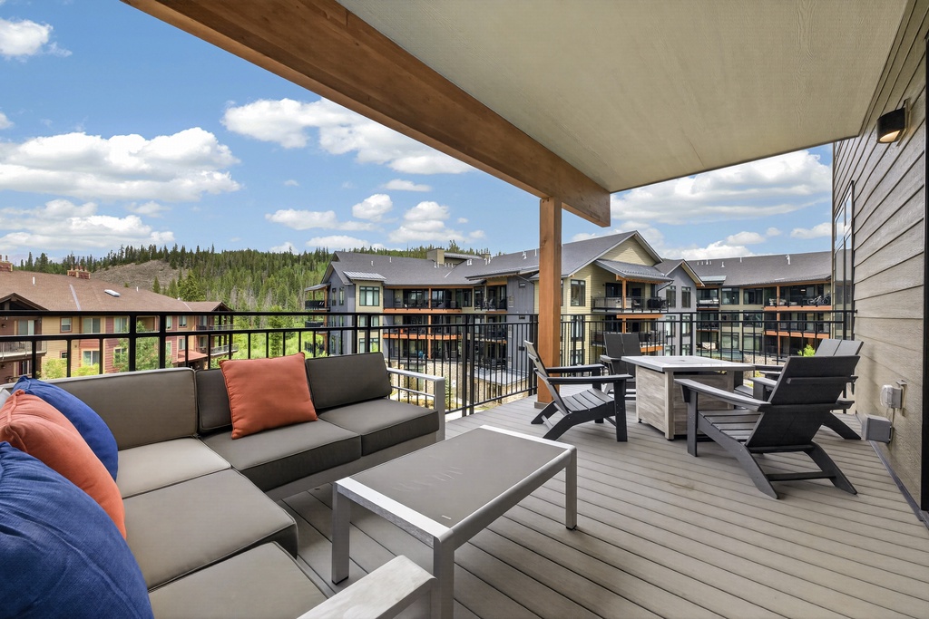 Settle into your private balcony with comfortable seating and open mountain views. Sip your morning coffee or unwind after a day of adventure in this peaceful, covered outdoor space designed just for you.