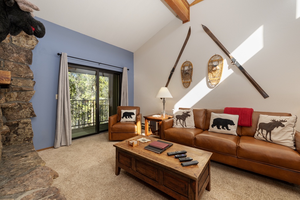 Unwind in your cozy mountain retreat with rustic charm, leather seating, and wildlife-themed touches that bring the outdoors in.