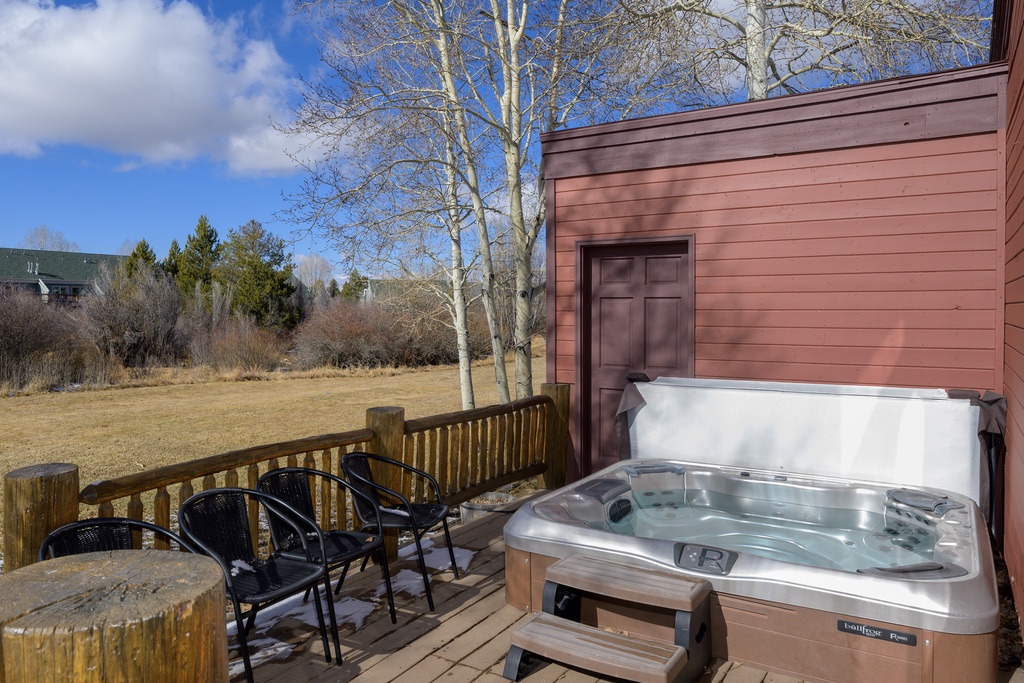 Soak in your private hot tub while mountain views stretch before you, creating the perfect backdrop for relaxation.