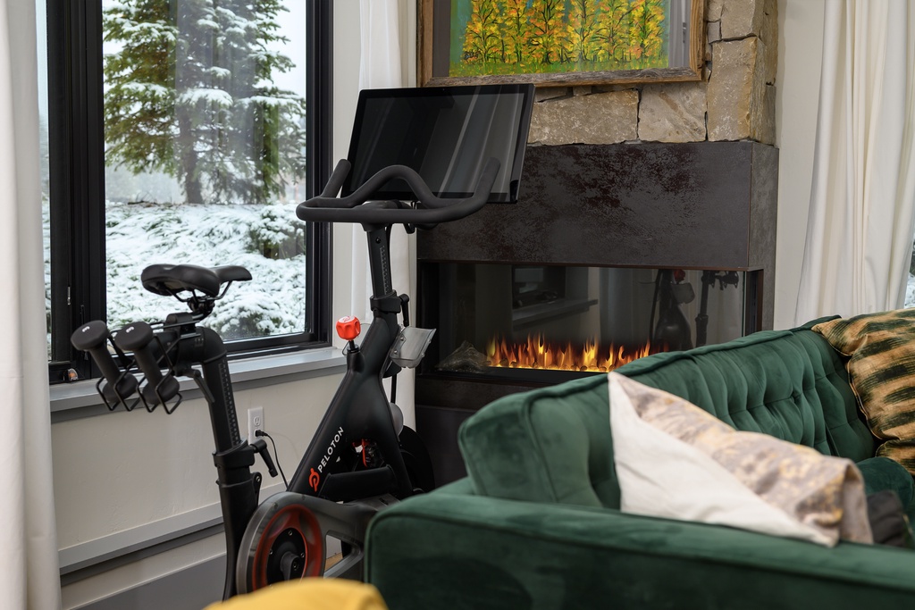 Stay active while enjoying cozy comfort by your fireplace, with winter views creating the perfect retreat backdrop.