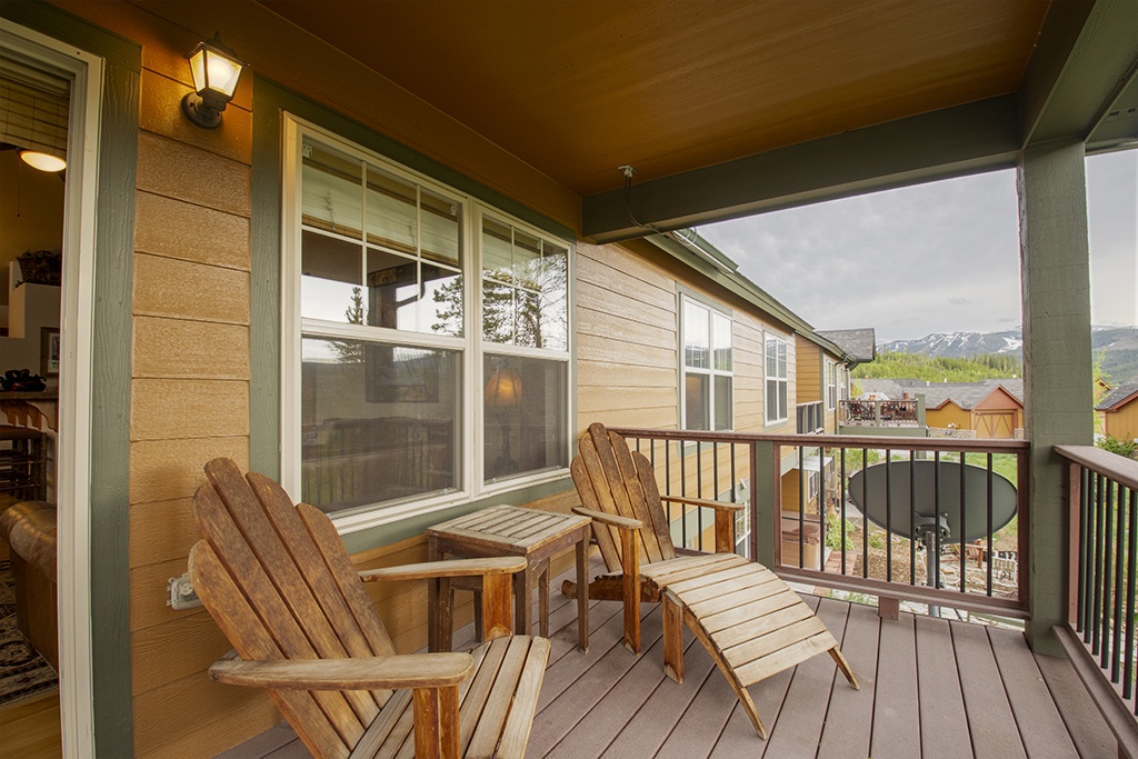 Relax in rustic Adirondack chairs on your private balcony, overlooking mountain peaks and peaceful valley views.