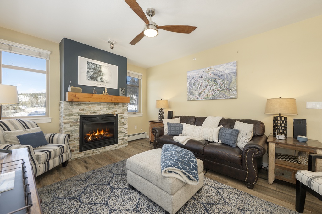 Cozy up by your crackling fireplace while snow falls outside - your perfect mountain retreat awaits with leather seating and ski trail maps.
