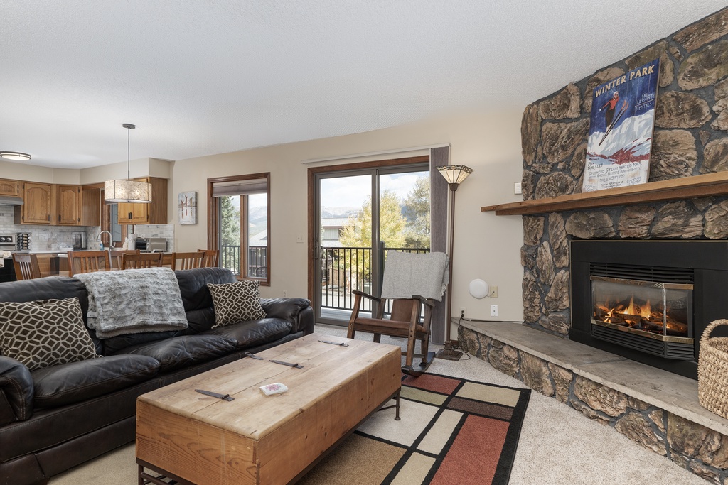 Cozy up by your crackling fireplace while mountain views fill the windows, creating the perfect après-ski retreat.