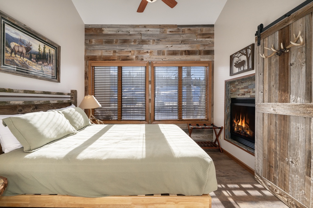 Sink into rustic luxury at Mountainside B-20 with your cozy fireplace crackling nearby and natural light streaming through your windows.