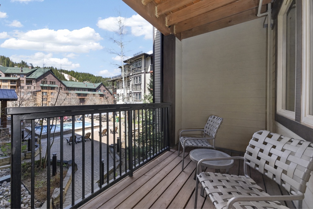 Step onto your private balcony and sink into a lounge chair with mountain village views. The perfect spot to sip your morning coffee while taking in the fresh alpine air.