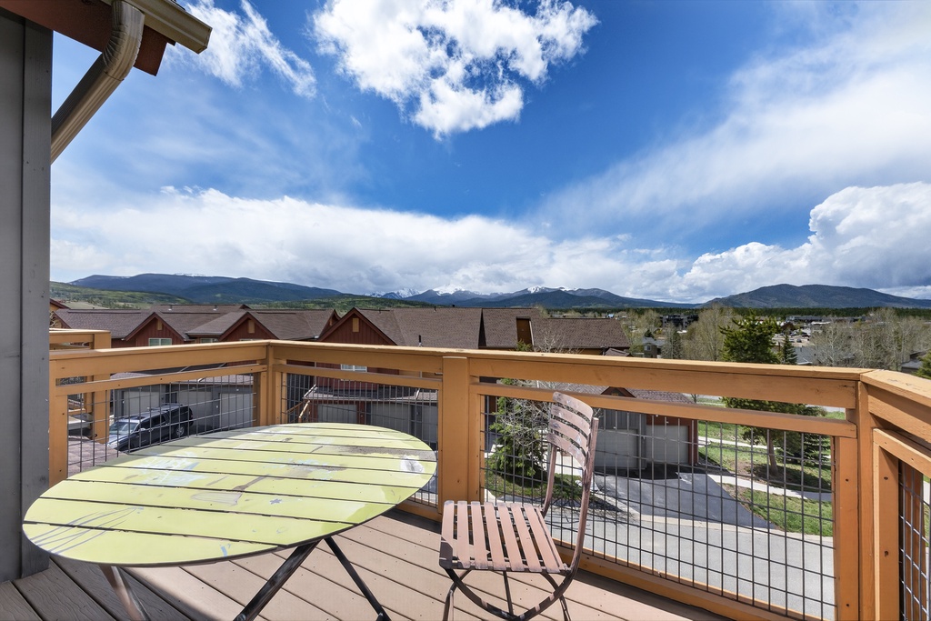 A private balcony featuring sweeping mountain and valley views, perfect for morning coffee or evening sunsets in the fresh alpine air.