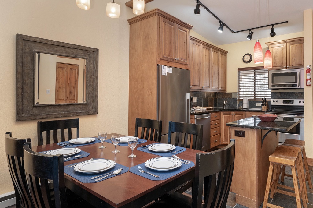 Gather around your elegant dining table for memorable meals, while the fully equipped kitchen invites you to create culinary adventures together.