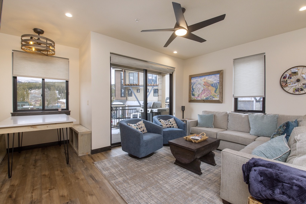 Unwind in your stylish living space with plush seating, mountain views, and modern touches that make every moment feel like home.