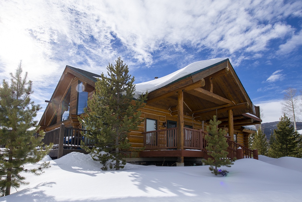 Miles Behind Log Cabin