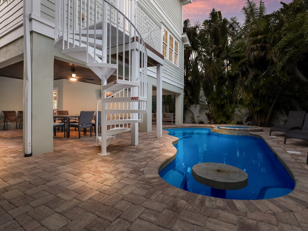 Private heated pool and swim-up table