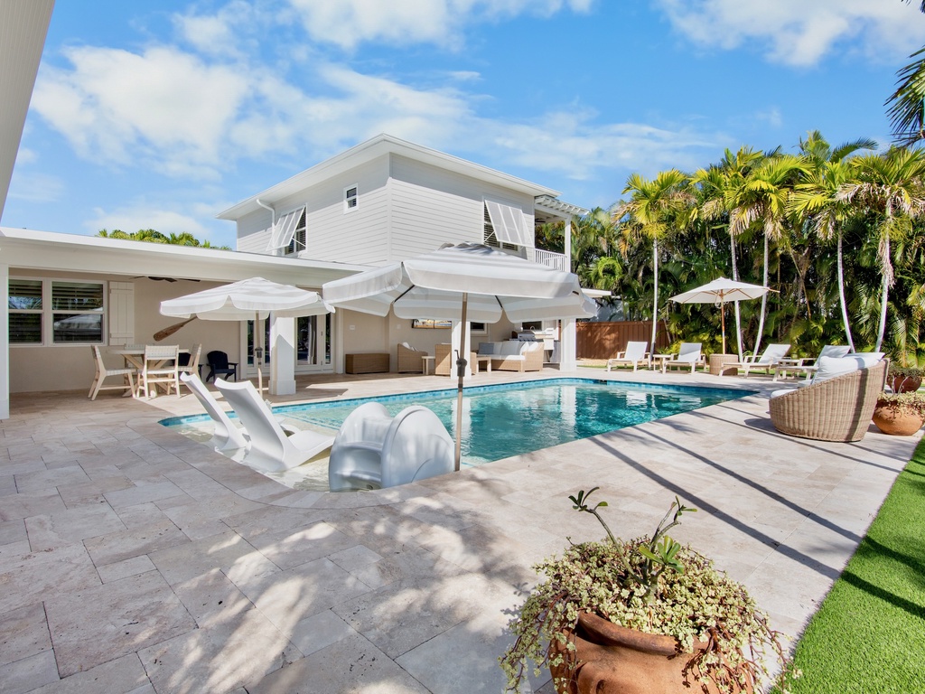 Private heated pool and outdoor lounge chairs