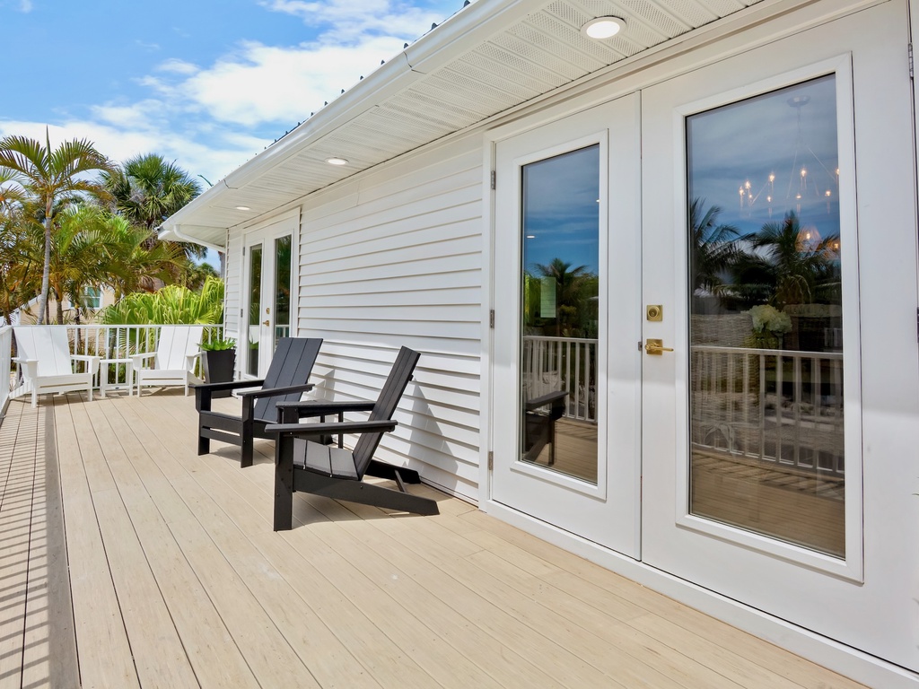Spacious outdoor balcony with lounge seating