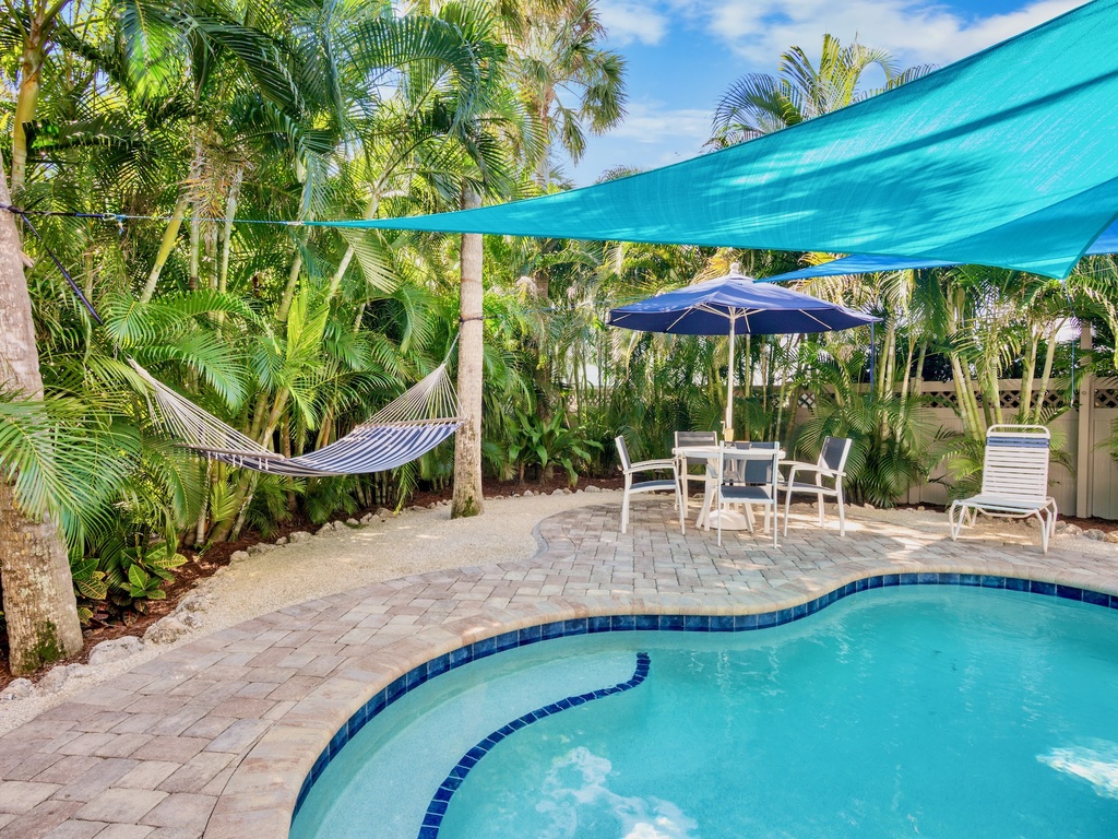 Private Heated Pool, hammock, and shaded dining area