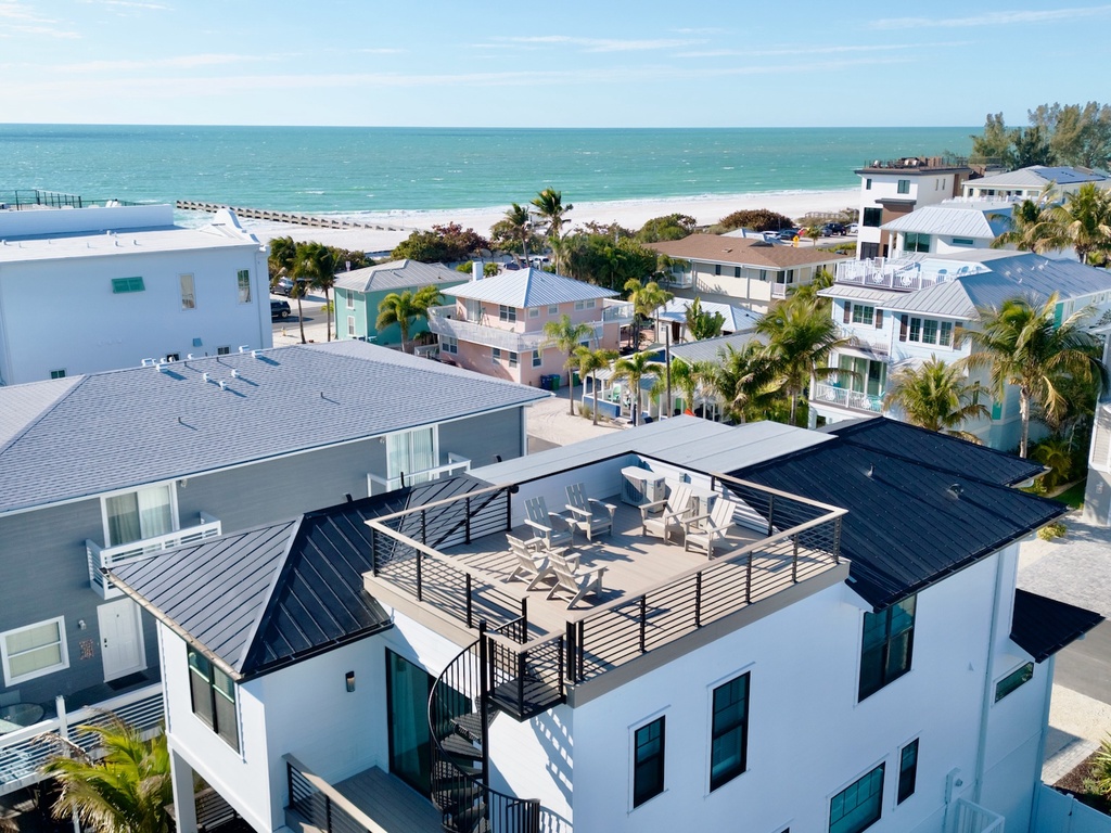 Rooftop deck with seating and views