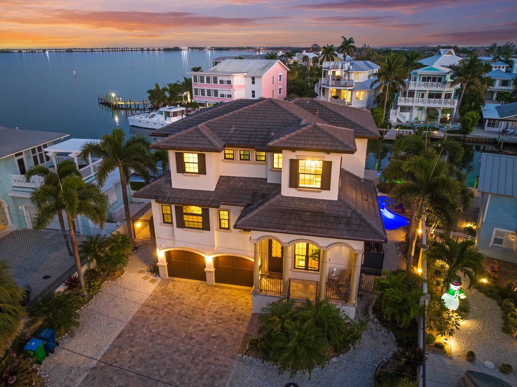 Stunning waterfront property with tropical landscaping