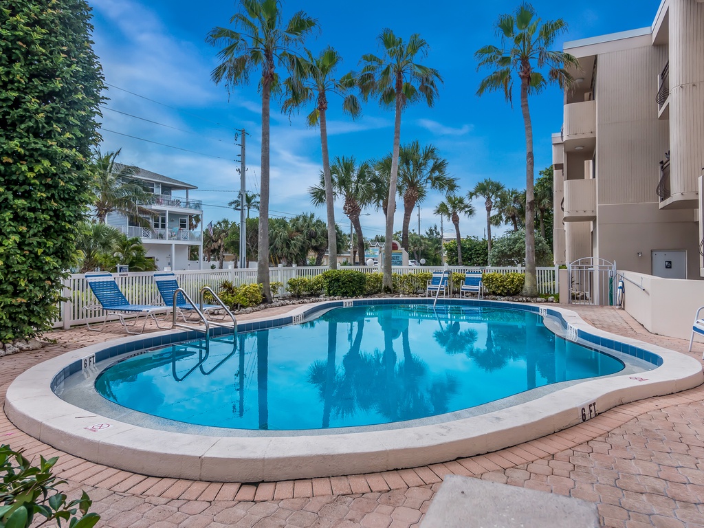 Community Pool with Lounge Chairs