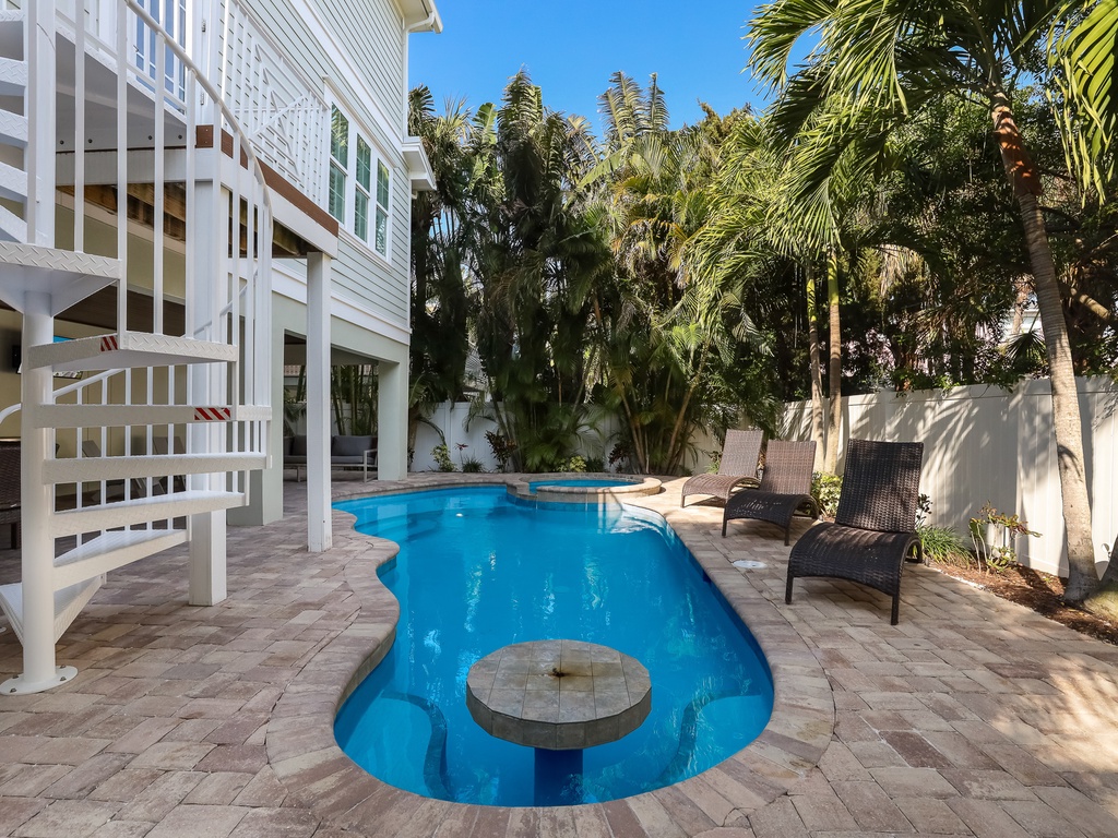 Private heated pool and swim-up table