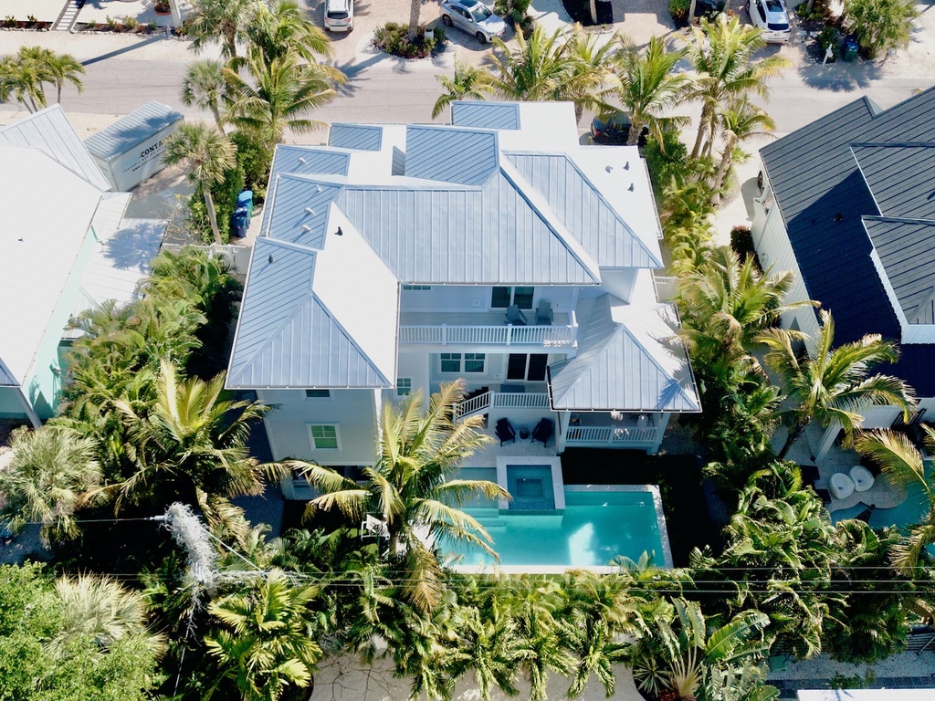 Aerial view of home and outdoor pool