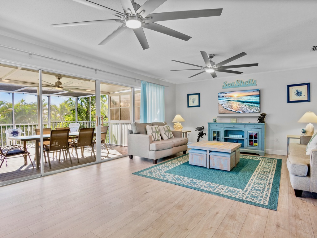 Living Room with sliding doors opening to your private balcony