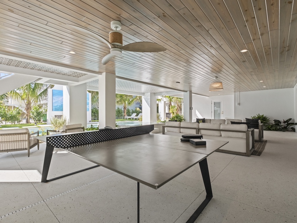 Game room with ping pong and modern seating area