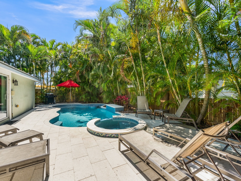 Private pool with sun loungers and BBQ grill