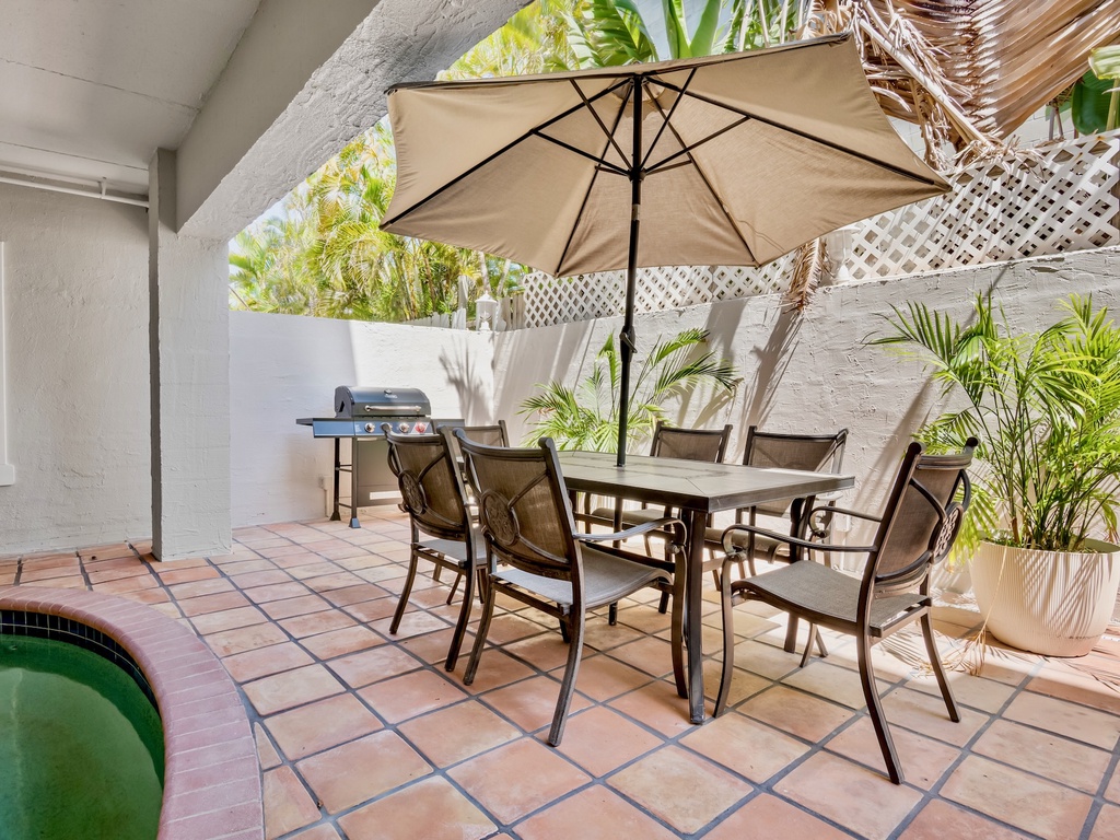 Shared Patio with BBQ and Dining Area
